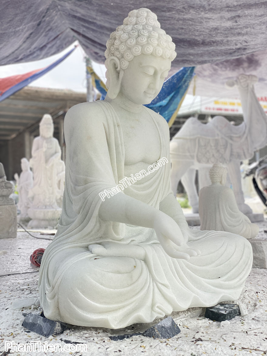 Tượng Phật A Di Đà bằng đá tự nhiên ban phước (ADI-12)